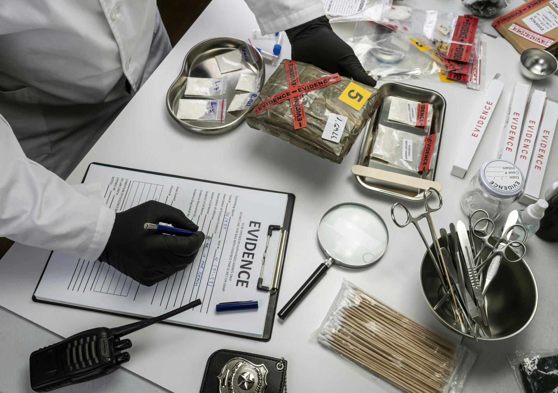 Police scientist examines seizures of adulterated fentanyl in crime lab, Conceptual Ima